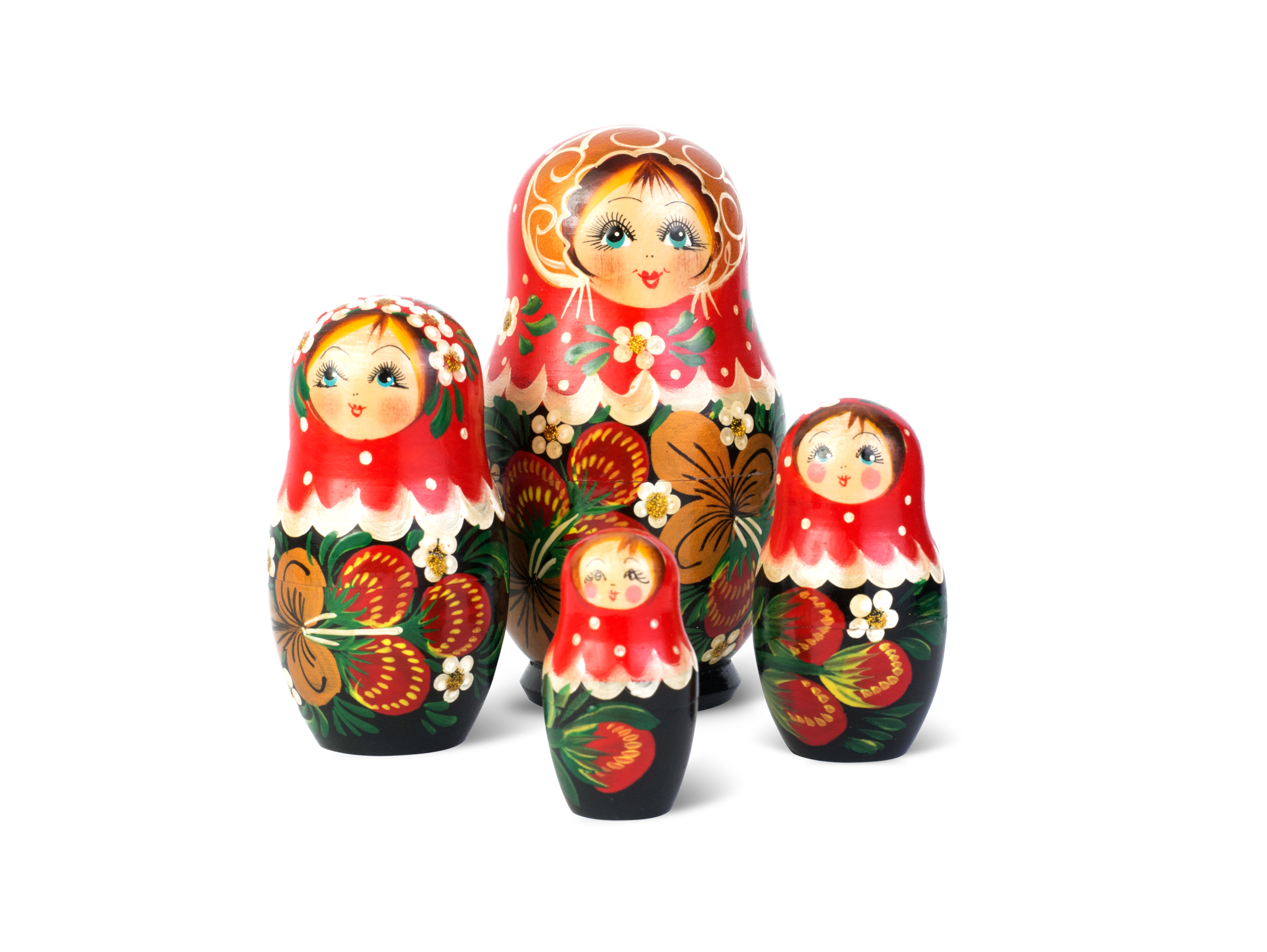 Four different sized babushka dolls in a formation